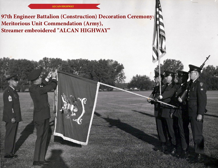 Organizational Day, 28 September 1968 (under LTC Dupont), 97th Engineers decorated with Meritorious Unit Commendation, embroidered streamer ALCAN HIGHWAY. CSM Gilbert Ritter watches as BG Linton Sinclair Boatwright, Post Commander, Fort Riley, attaches the streamer, which was authorized 15 April 1943 but never attached to the 97th Enginner Battalion Colors