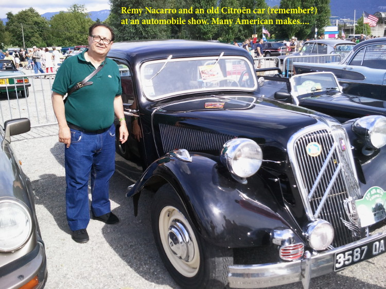 Remy Nacarro and an old Citroen car at an automobile show