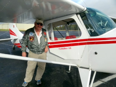 Doc Clement and his aircraft, N8392